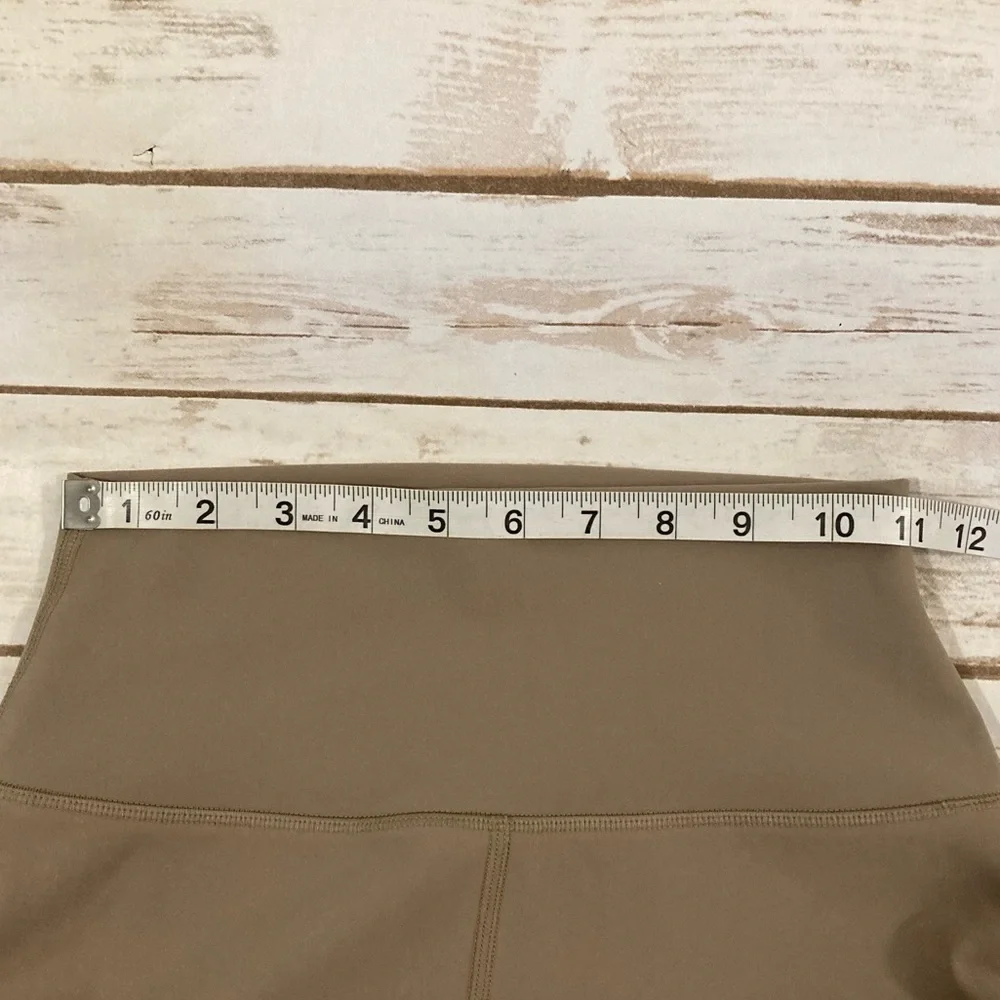 ALO YOGA HIGH WAISTED RIPPED WARRIOR LEGGING IN TAN XS